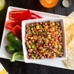 Caviar Dip on a plate with chips and veggies