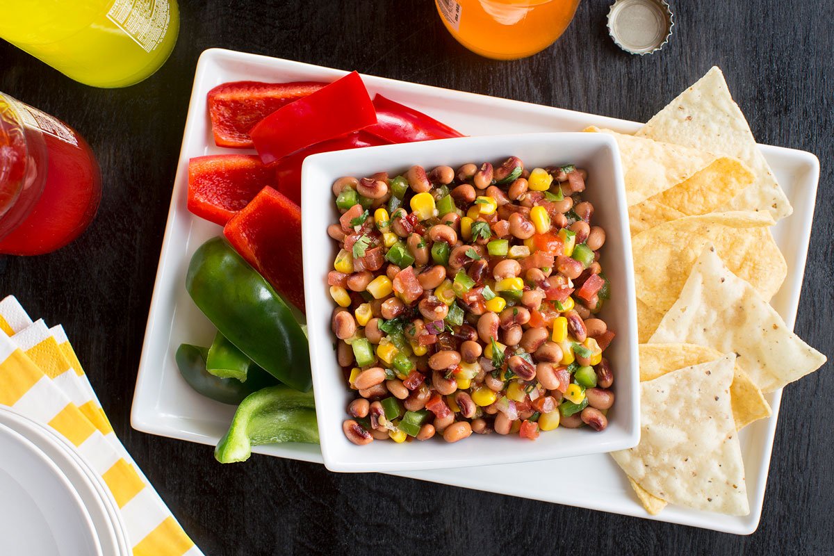 Caviar Dip on a plate with chips and veggies