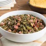 White Bowl of quick-cook Southern-Style Greens on a napkin on a table